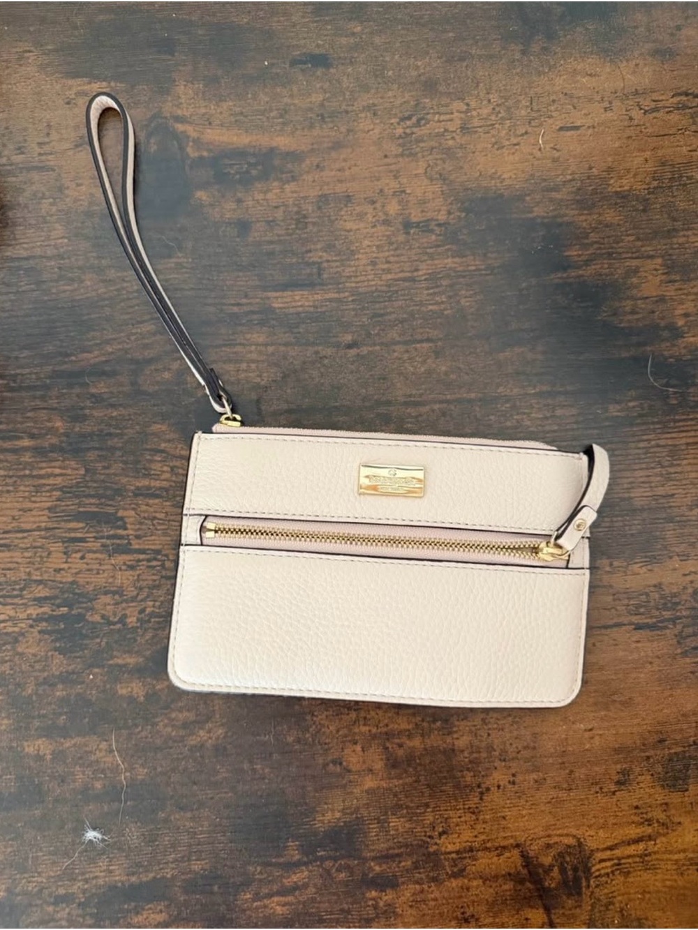 kate spade • Leather Wristlet Clutch in Cream